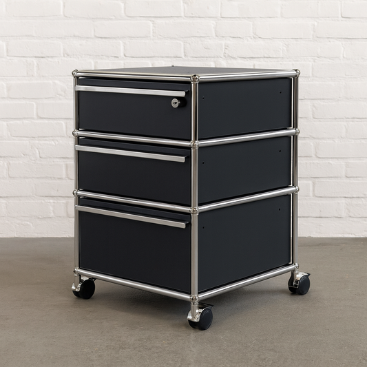USM Haller anthracite gray roll container with three drawers, one lockable, on casters