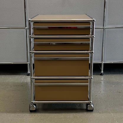 USM Haller beige rollcontainer with four drawers and chrome frame on wheels