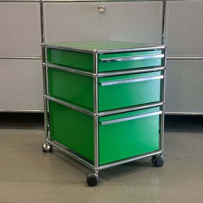 USM Haller Rollcontainer in green with three drawers on wheels