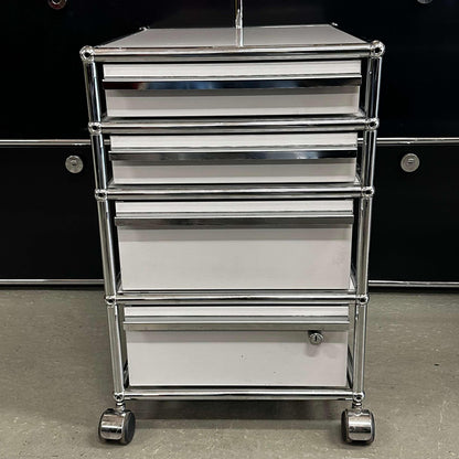 USM Haller Rollcontainer in light gray with 4 drawers, one drawer with lock, on wheels