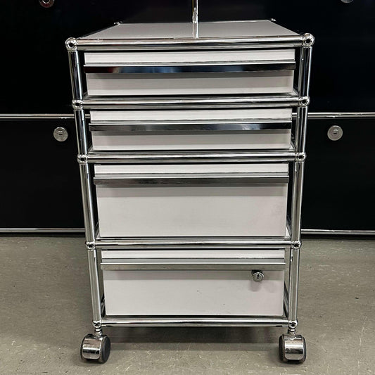 USM Haller Rollcontainer in light gray with 4 drawers, one drawer with lock, on wheels