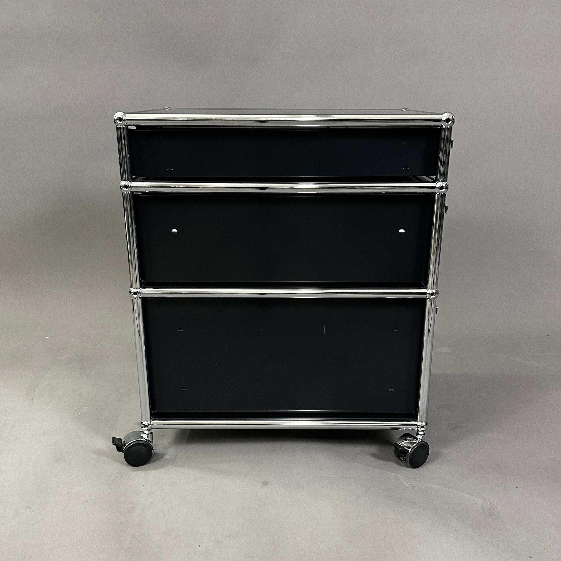USM Haller Rollcontainer black with three drawers and chrome frame on wheels, 42x61x53 cm