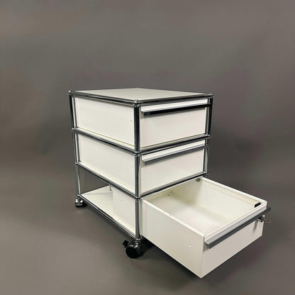 USM Haller Rollcontainer white 3-drawer mobile storage unit with metal frame and caster wheels