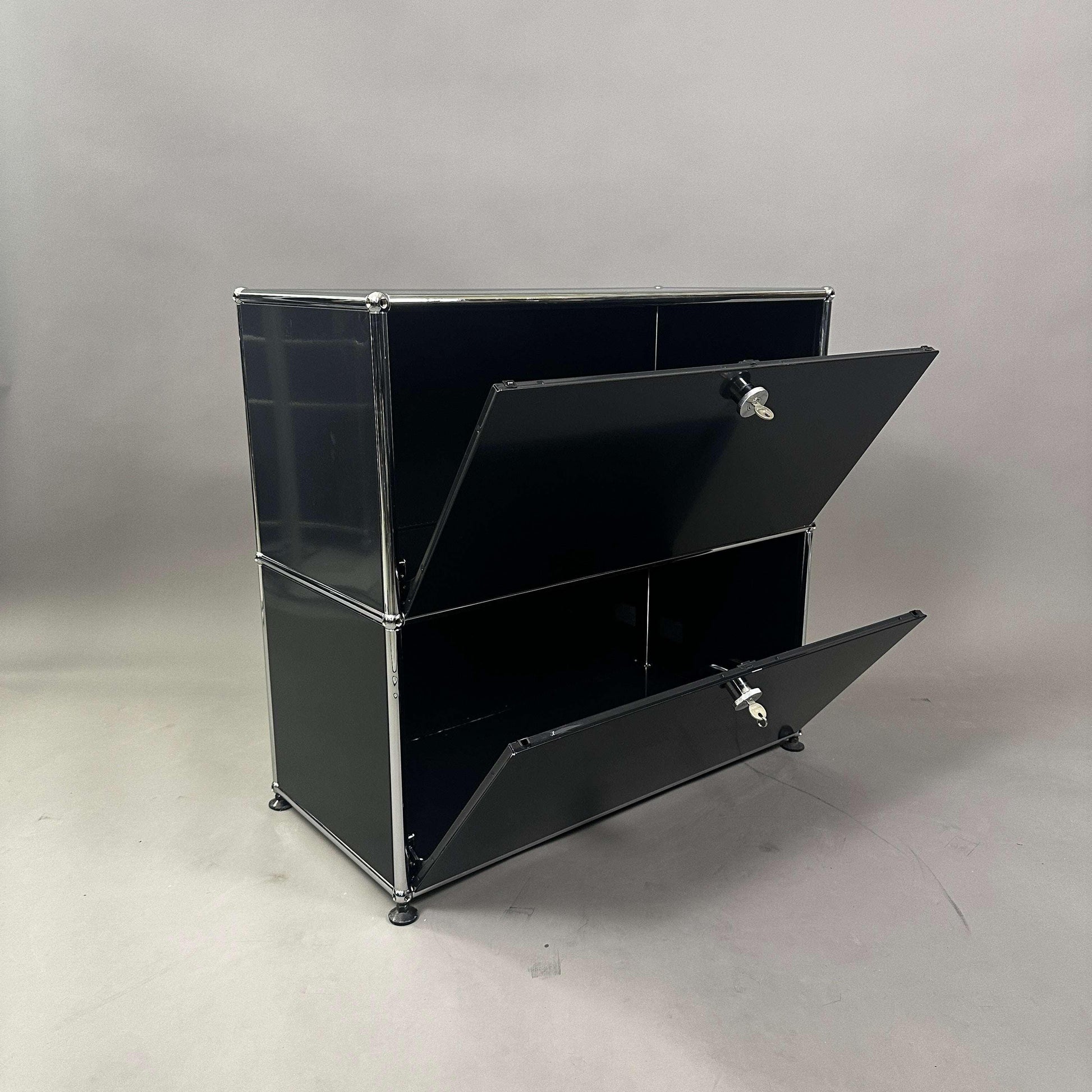 USM Haller Sideboard 1x2 in graphite black with two lockable flap doors and metal frame