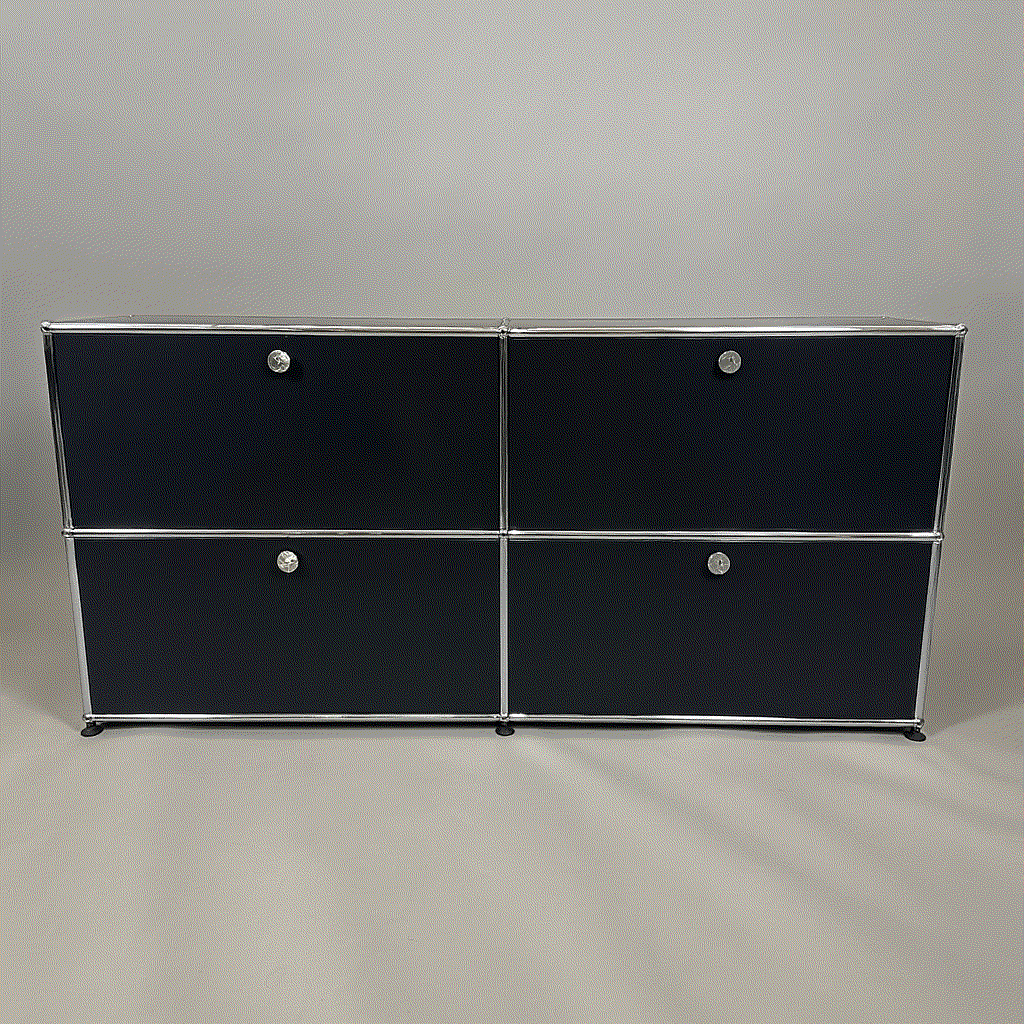 USM Haller Sideboard 2x2 in graphite black with four flap doors and chrome frame, measuring 153x75x38 cm