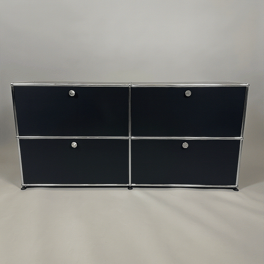 USM Haller Sideboard 2x2 in graphite black with four flap doors and chrome frame, measuring 153x75x38 cm