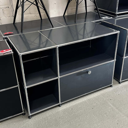 USM Haller Sideboard in anthracite with open shelves and closed compartment, sleek modular metal design for versatile storage.