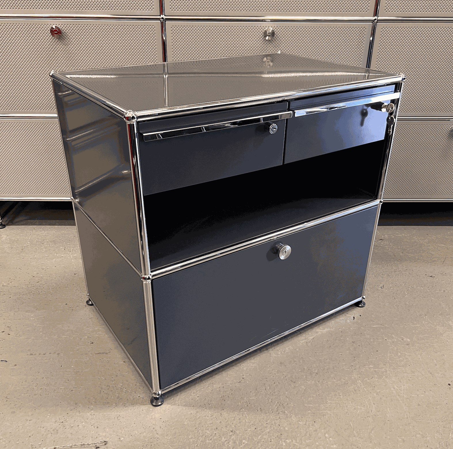 USM Haller Sideboard anthracite with chrome frame, one pull-out drawer and two upper drawers, modern storage unit.