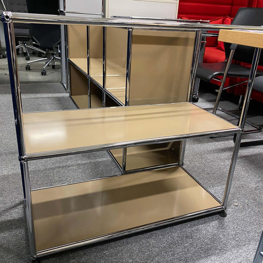 Beige USM Haller Sideboard with open shelves and chrome frame in office setting