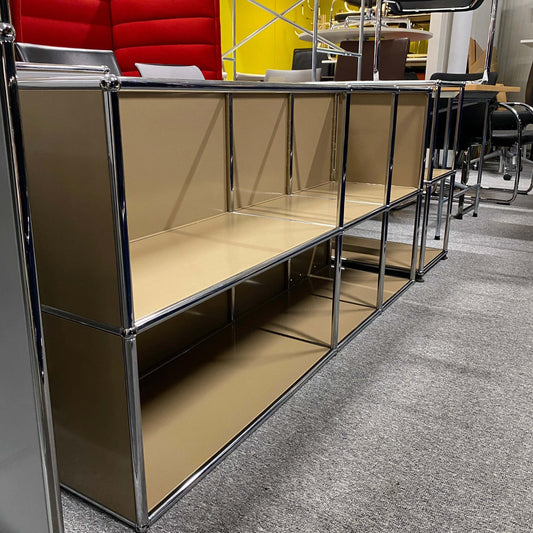 USM Haller Sideboard beige 3x2 open shelving unit with chrome frame on office carpet floor