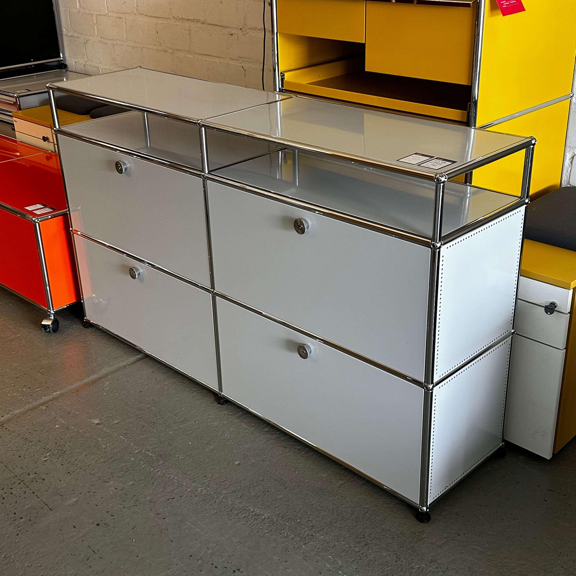 USM Haller light grey sideboard with 2x2 flap compartments and glass top, 151x88x37cm