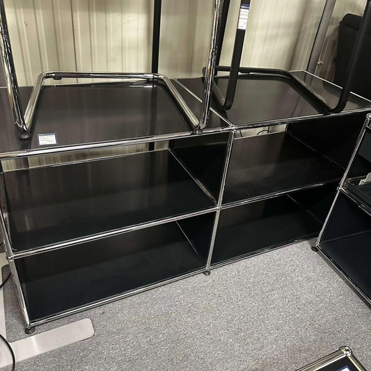 USM Haller Sideboard in graphite black with 2x2 open compartments and chrome frame, measuring 152x74x52cm