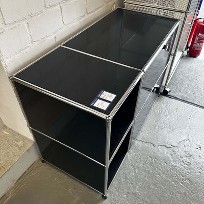 Black USM Haller Sideboard with metal frame and glass top, dimensions 112.3x74x52.3 cm