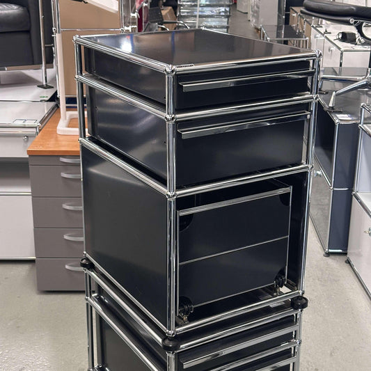 Black USM Haller Standcontainer with 2 drawers and hanging file cabinet in modern office setting