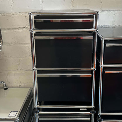 Black USM Haller stand container with three drawers and chrome frame