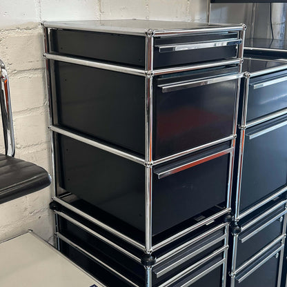 Black USM Haller stand container with three drawers and chrome frame