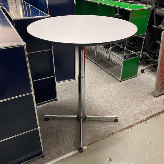 USM Kitos Hubtisch 90cm round adjustable height table with chrome base and white top