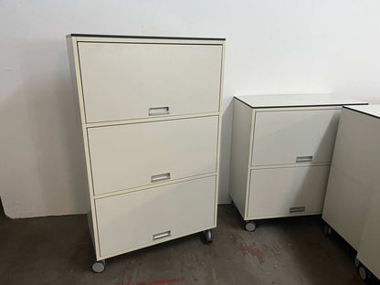 Vario M1 Highboard white and light gray storage unit with three compartments on wheels