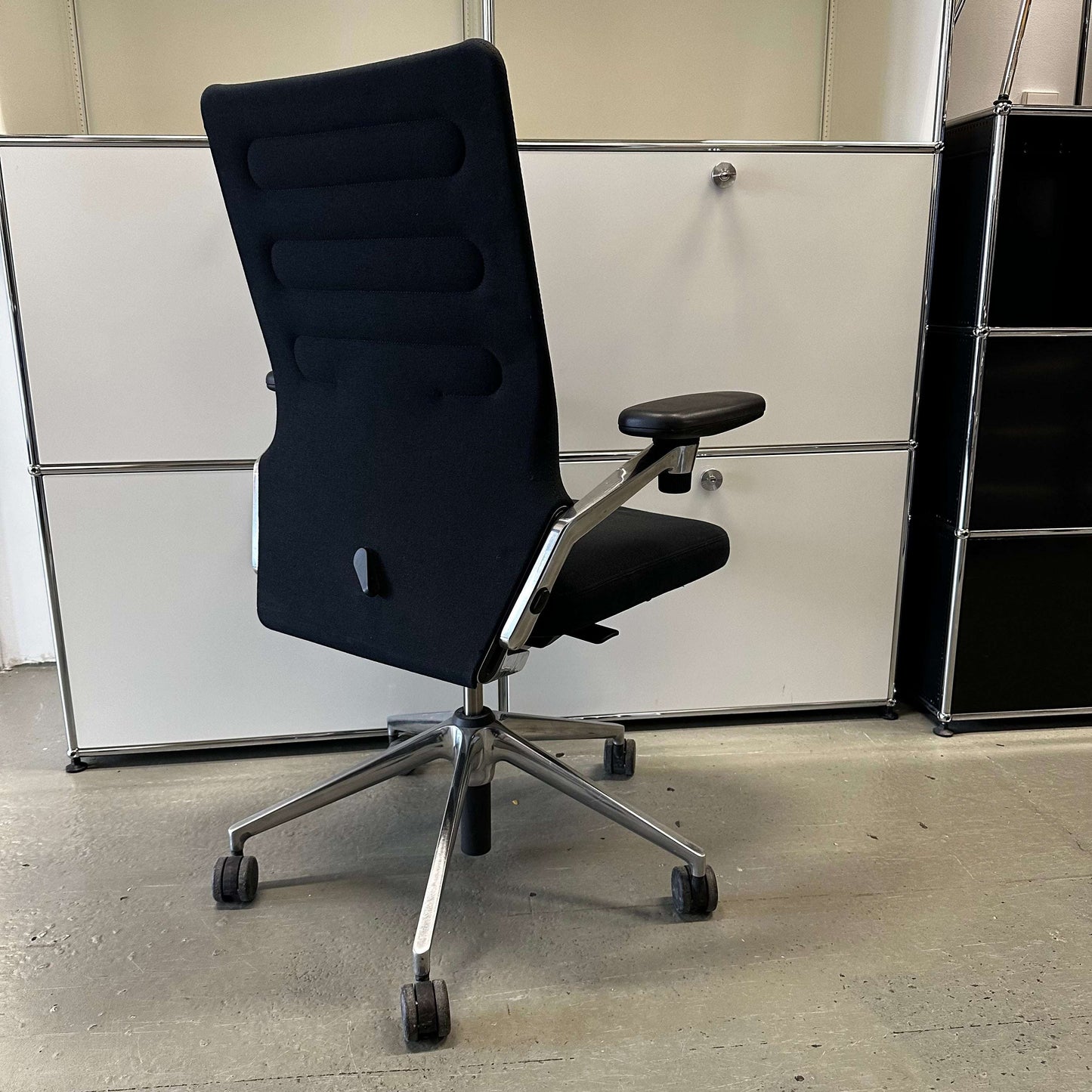 Vitra AC 4 ergonomic black office chair with chrome frame and adjustable armrests