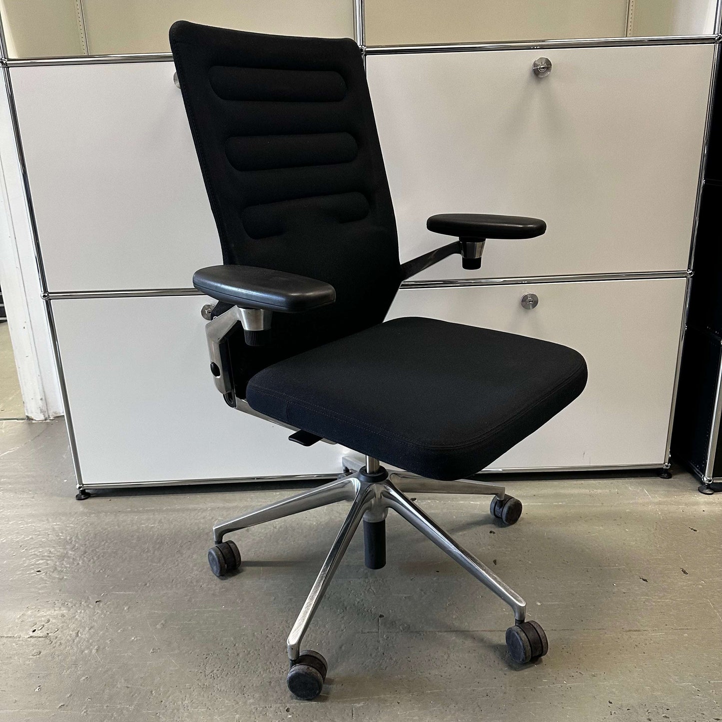 Vitra AC 4 ergonomic black office chair with chrome frame and adjustable armrests