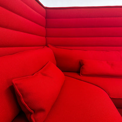 Red expandable Vitra Alcove Ecke corner sofa with cushions and padded backrest