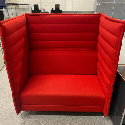 Vitra Alcove highback love seat in red with padded sides and backrest