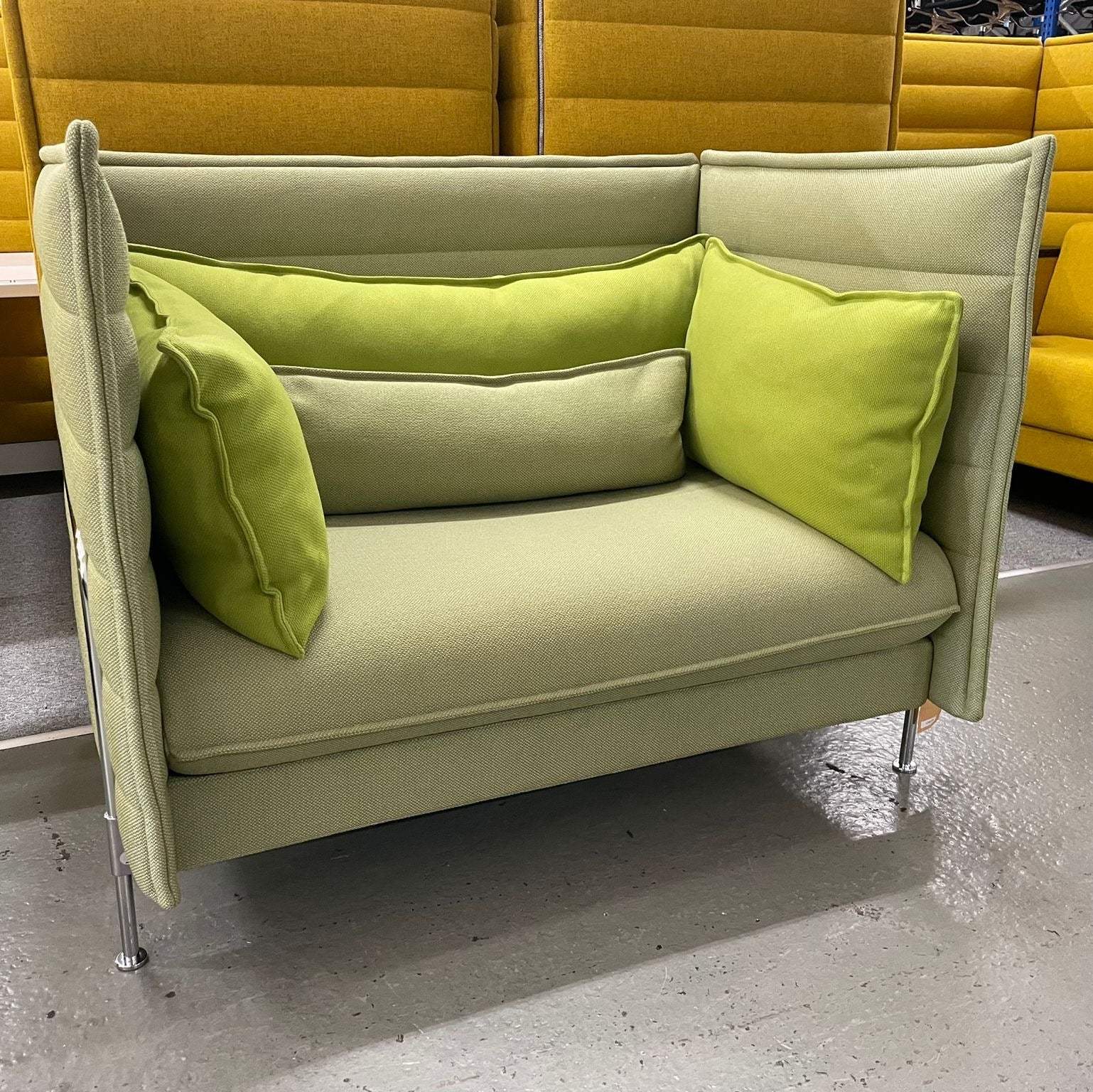 Vitra Alcove Lowback Love Seat in green with side panels and cushions, 120x98x87cm