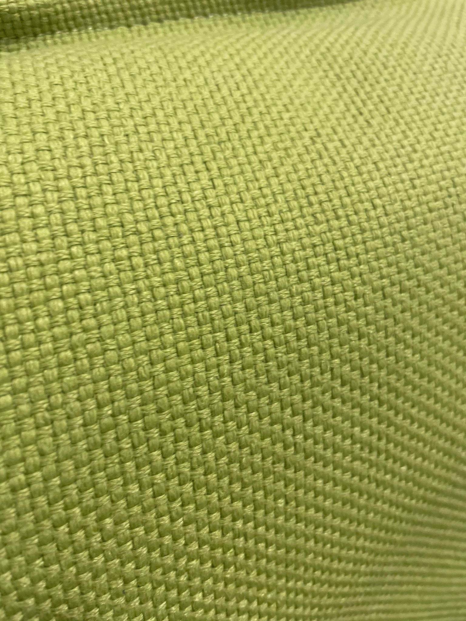 Close-up of green textured fabric of Vitra Alcove Lowback Love Seat upholstery