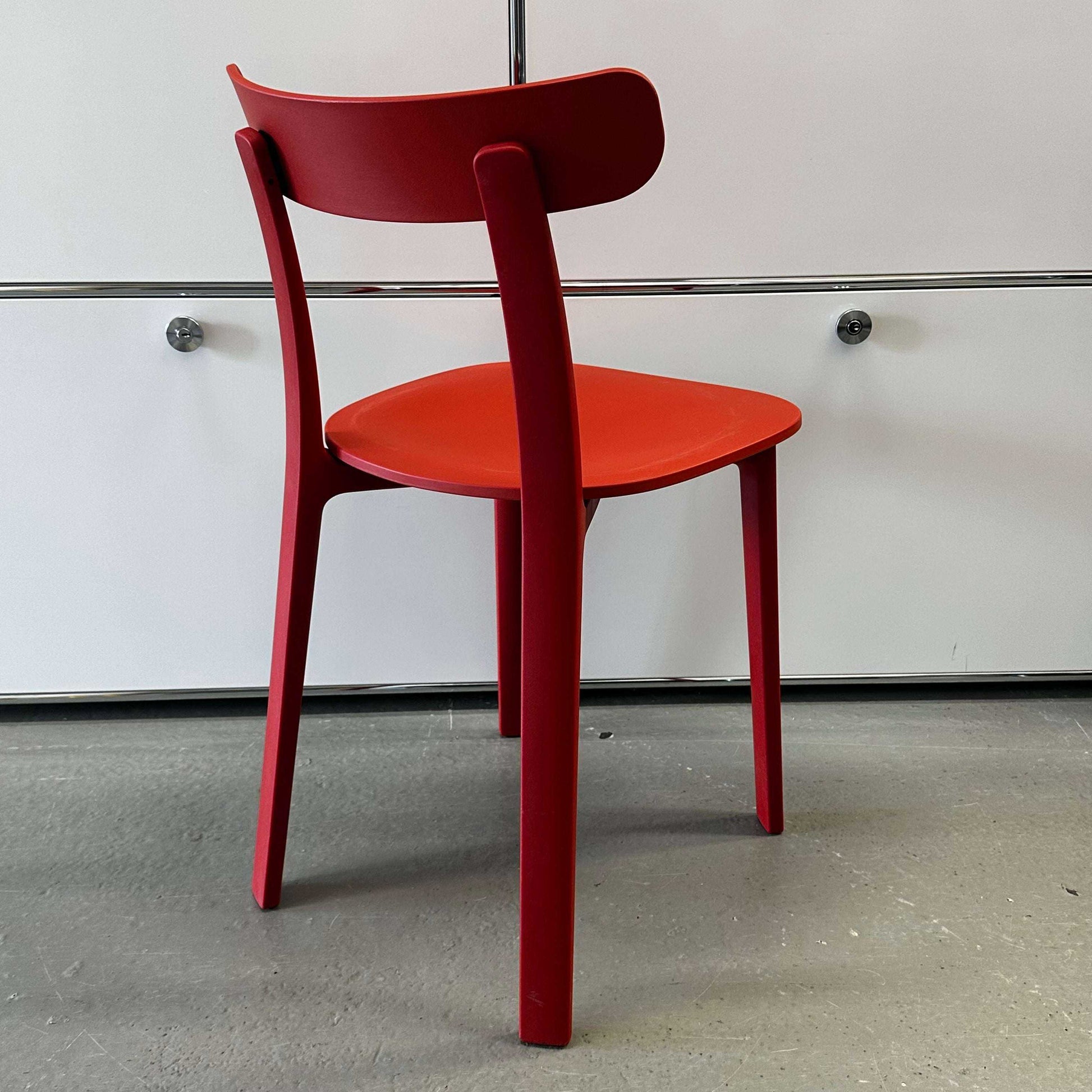 Vitra All Plastic Chair in Backstein red with minimalist design and ergonomic shape, suitable for indoor and outdoor use