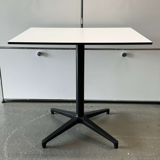 Vitra Bistro Table with white square top and black pedestal base, 80x65cm, modern indoor/outdoor design