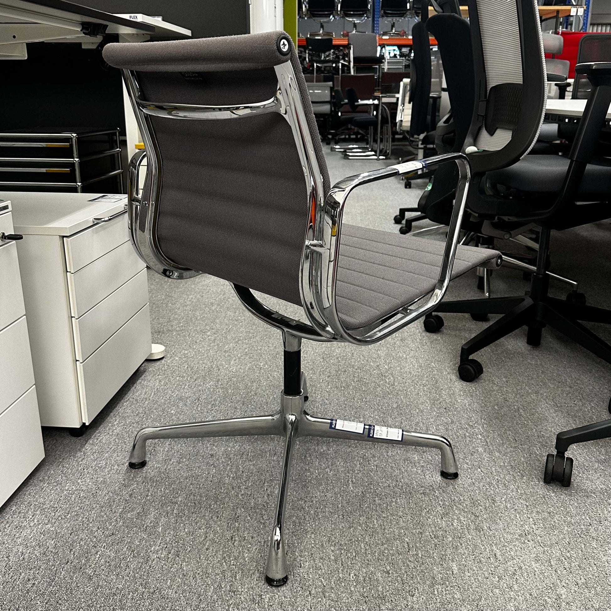 Vitra EA 107 office chair in medium grey hopsak fabric with non-swivel chrome frame