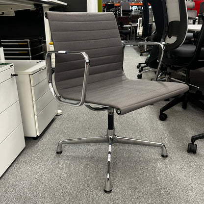 Vitra EA 107 office chair in medium gray hopsak fabric with chrome frame and fixed swivel base