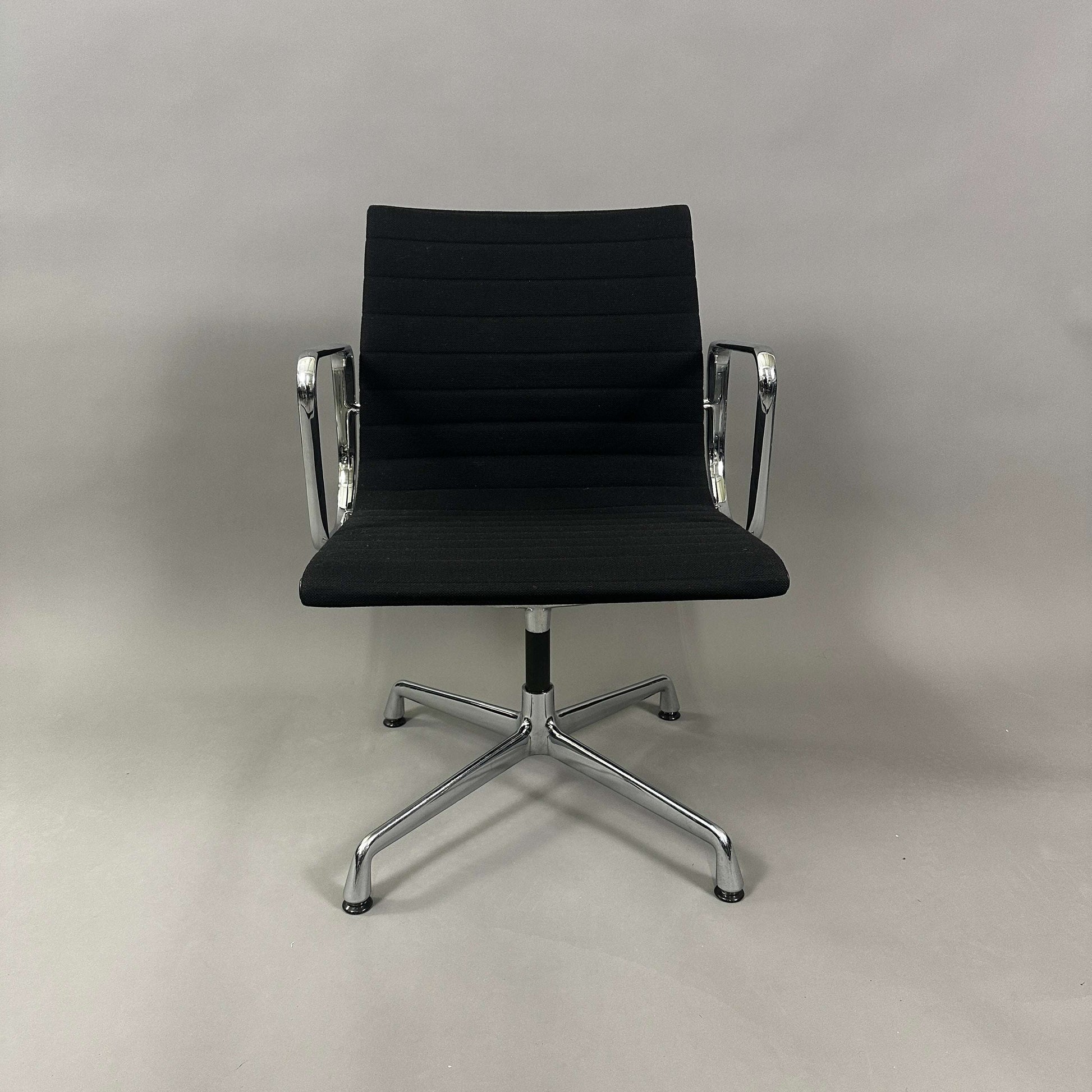 Vitra EA 107 Hopsak black non-swivel office chair with chrome aluminum frame and fabric upholstery