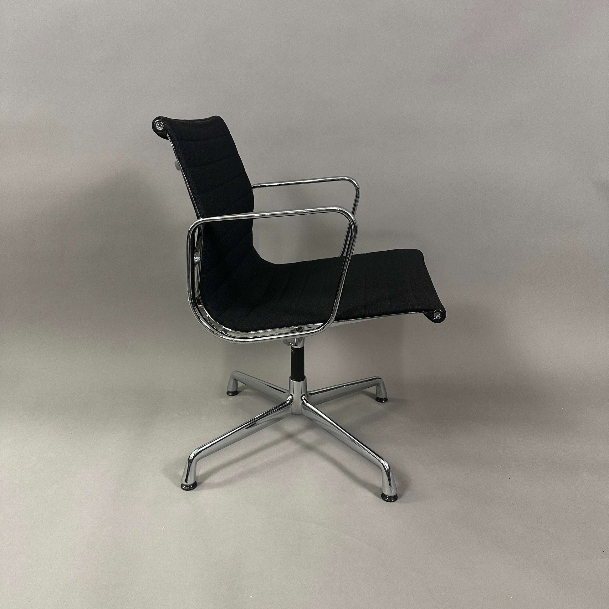 Vitra EA 107 Hopsak black non-swivel office chair with chrome aluminum frame and black hopsak fabric upholstery