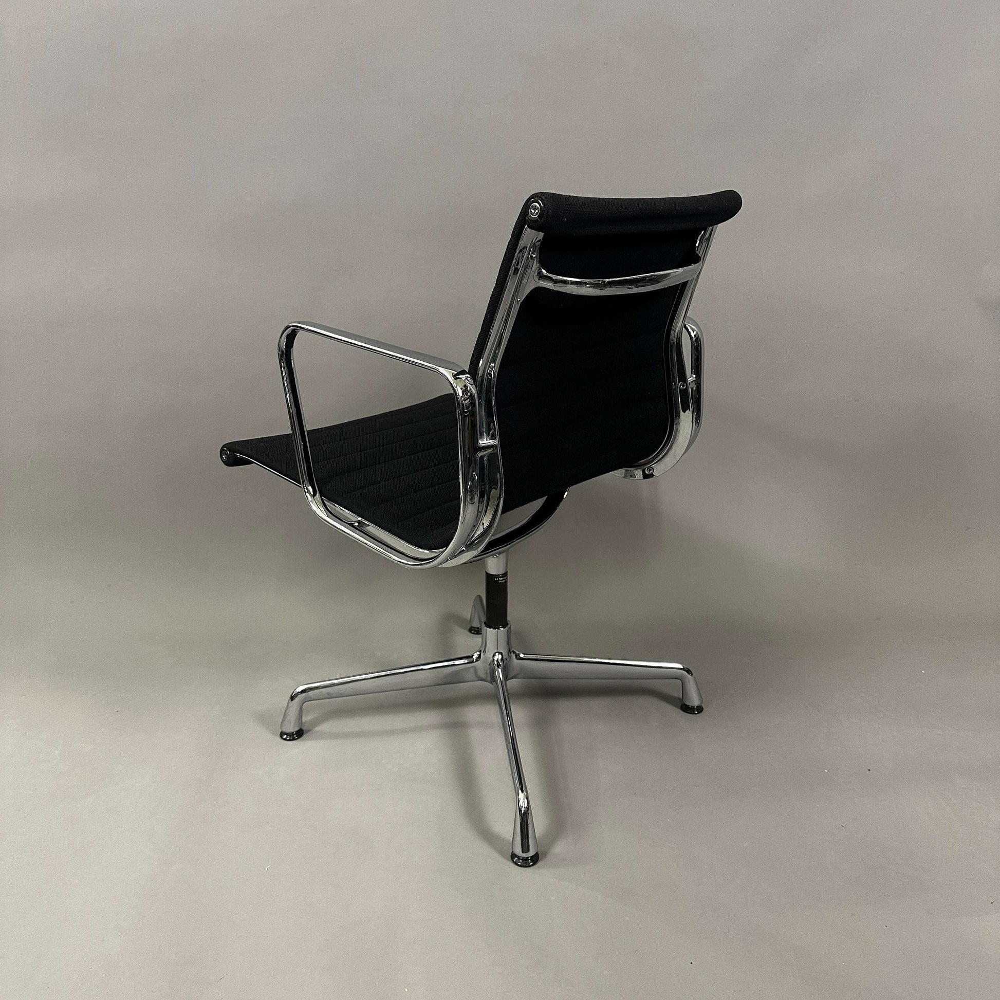 Vitra EA 107 Hopsak black office chair with chrome aluminum frame, non-swivel design
