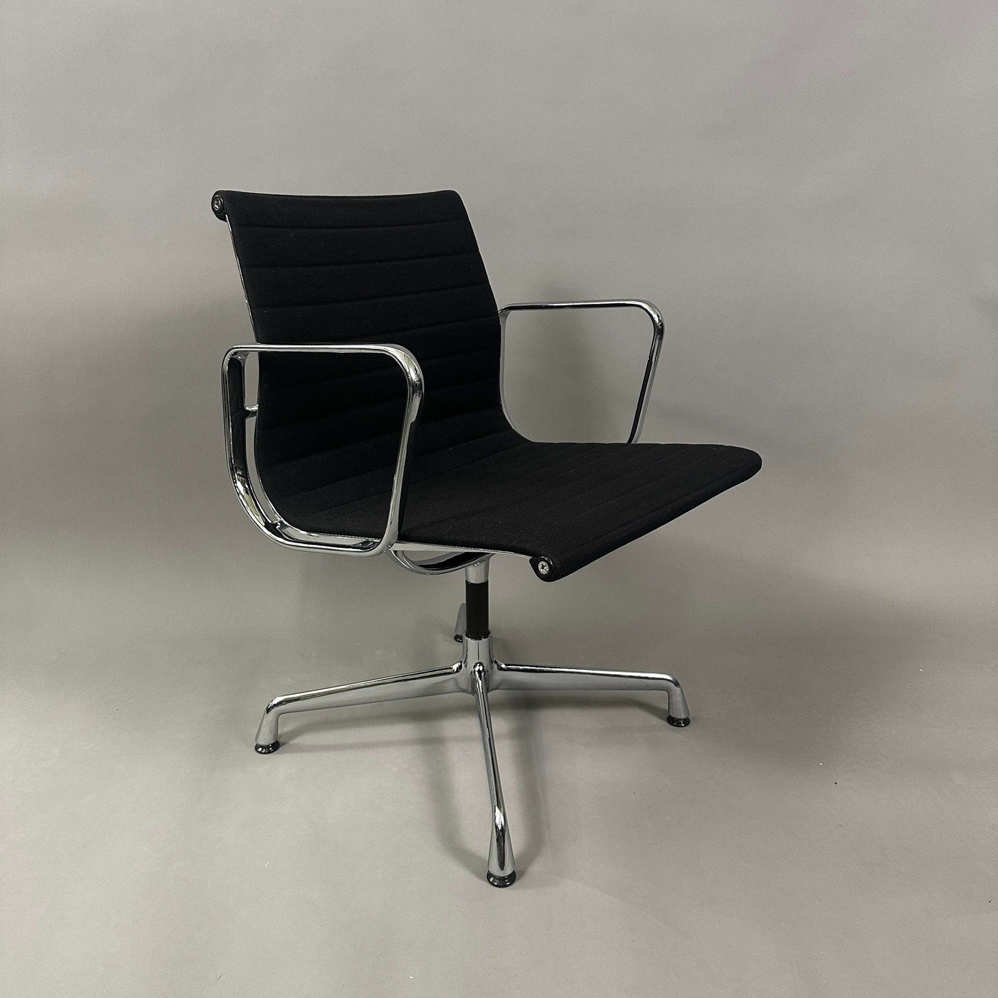 Vitra EA 107 Hopsak black office chair with chromed aluminum frame, non-swiveling design
