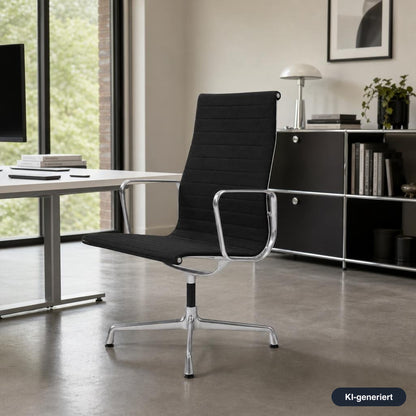 Schwarzer Vitra EA 112 Bürostuhl mit Hopsak-Bezug und poliertem Aluminiumgestell in einem modernen Büro.