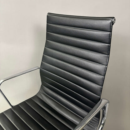 Vitra EA 119 black leather office chair with chrome frame and adjustable tilt function