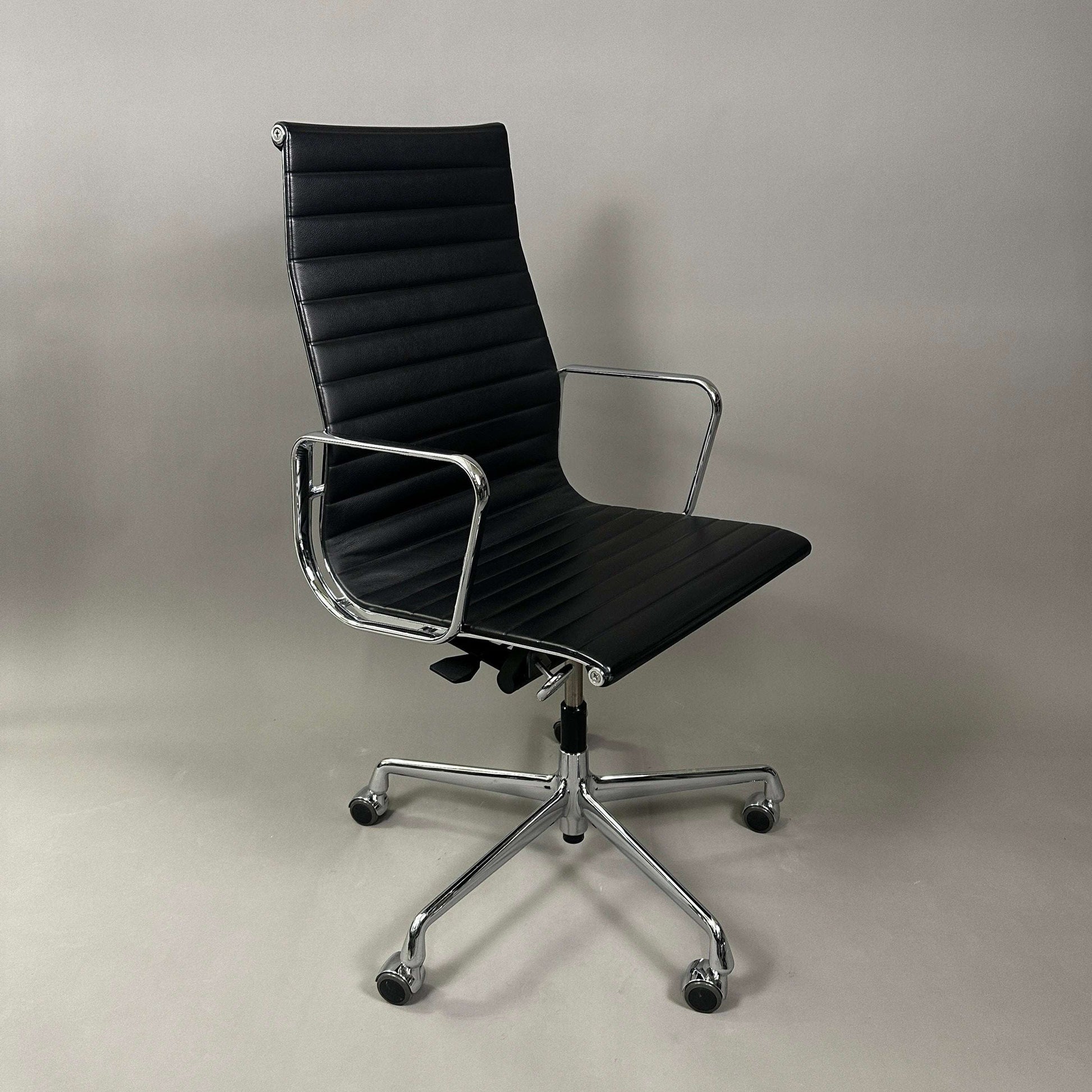Vitra EA 119 black leather office chair with chrome frame and adjustable tilt function