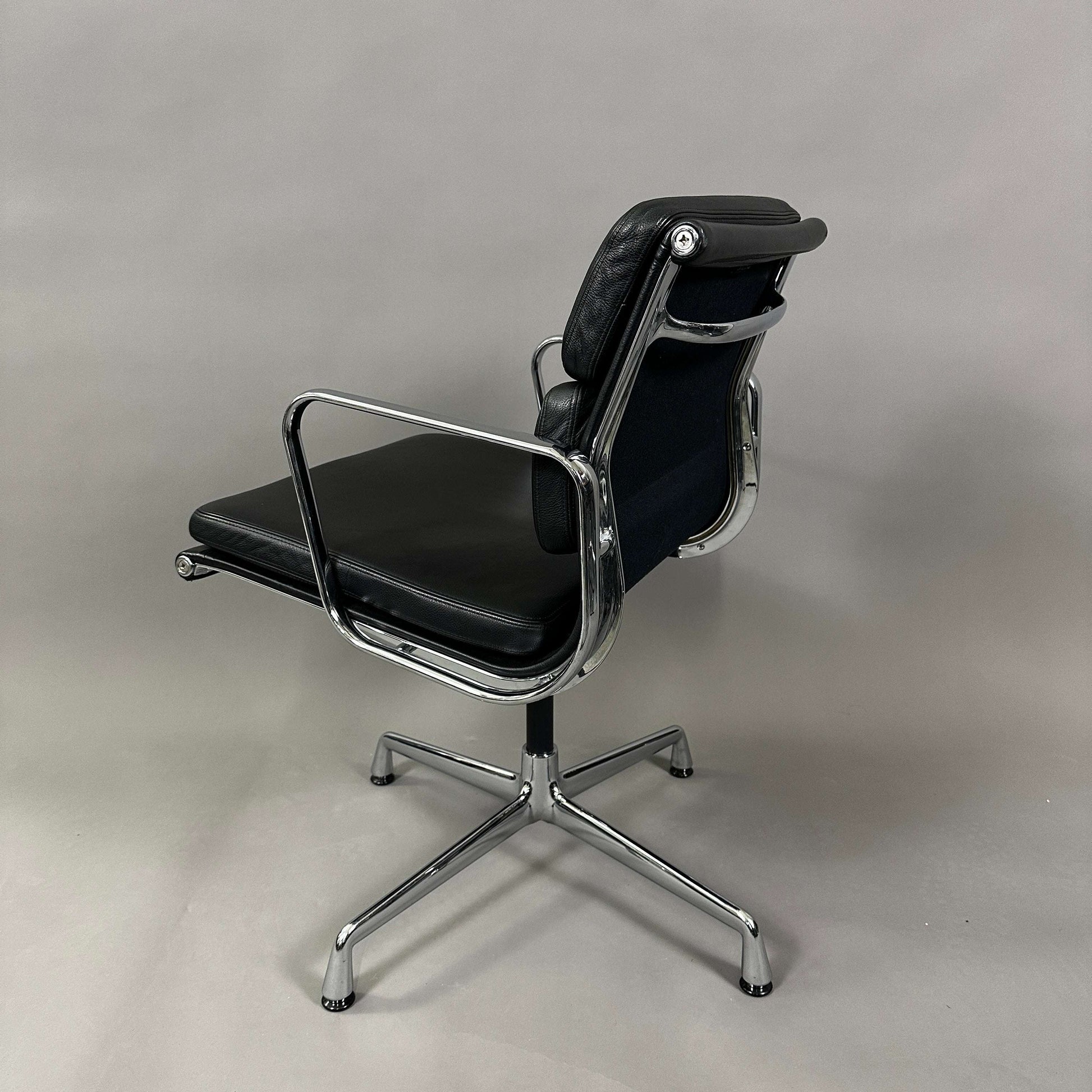 Vitra EA 208 black leather soft pad office chair with chrome swiveling frame