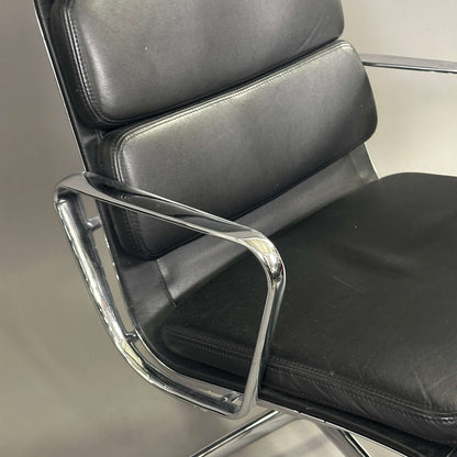 Vitra EA 216 black soft pad leather office chair with chrome armrests and swivel base