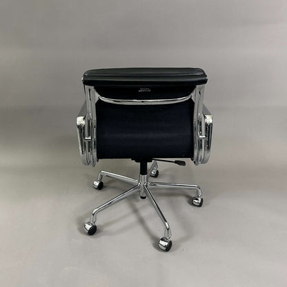 Vitra EA 217 black leather office chair with chrome frame viewed from the back