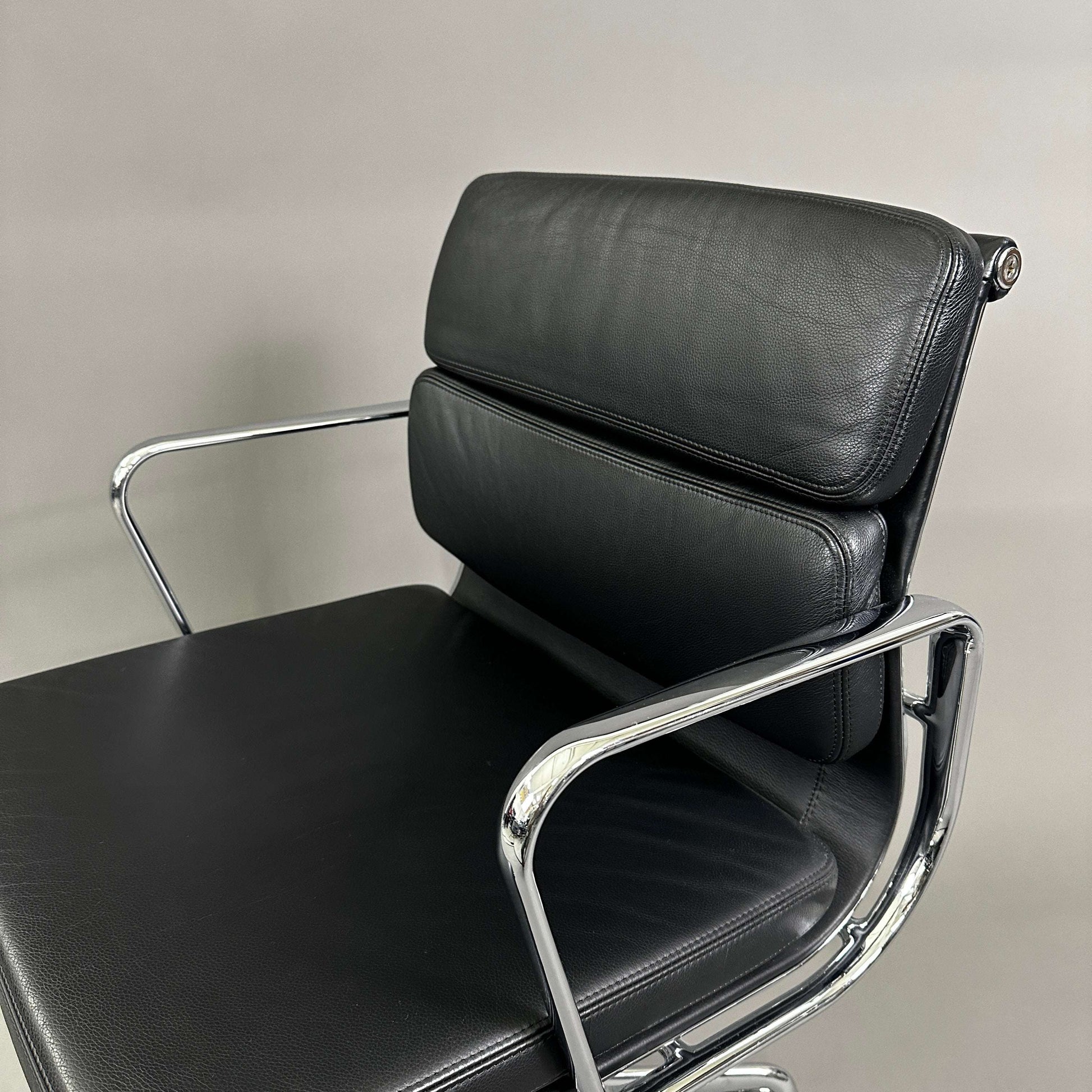 Vitra EA 217 black leather office chair with chrome frame and adjustable height