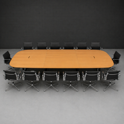 Vitra Eames Segmented Table, 430x250cm, Eichenfurnier, mit zwei Elektrifizierungen, umgeben von schwarzen Lederstühlen.
