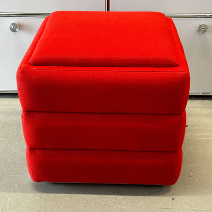 Red Vitra Hopsak Hocker stool upholstered in textured fabric, measuring 48x48x43cm.
