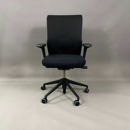Vitra ID Mesh ergonomic black office chair with adjustable armrests, lumbar support, and breathable diamond mesh backrest