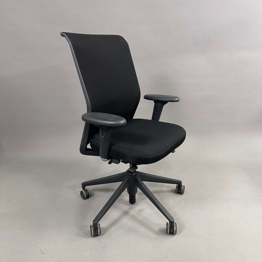 Black Vitra ID Mesh office chair with adjustable seat height, depth, backrest tension, lumbar support, 3D armrests, and tilt lock