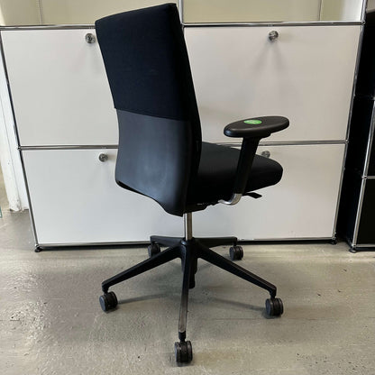 Vitra ID Soft black office chair with ergonomic design, fabric seat, and black plastic base