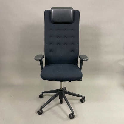 Vitra ID Trim L ergonomic office chair with black fabric seat and leather headrest, adjustable armrests and lumbar support