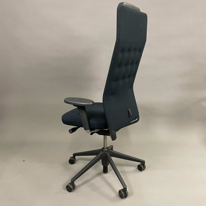 Vitra ID Trim L ergonomic office chair with black fabric seat and black leather headrest, adjustable height, depth, armrests, lumbar support, and reclining functions